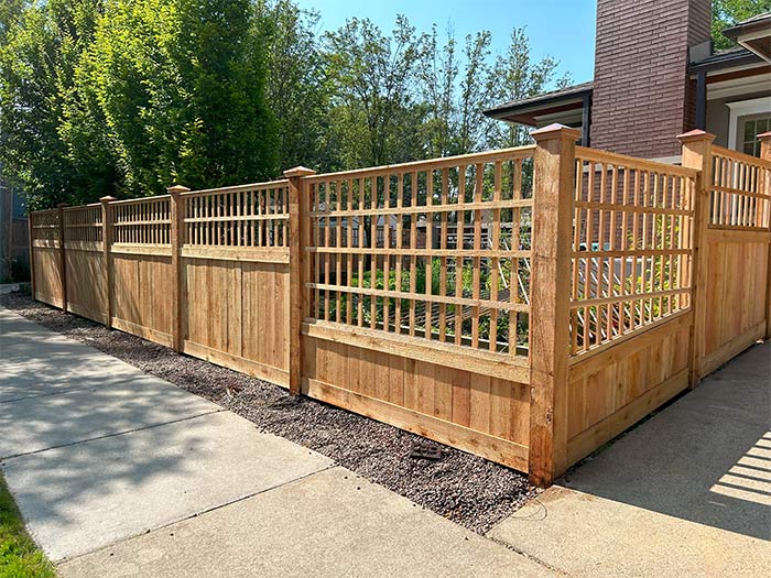 A beautiful wood fence that displays our expertise as a custom fence contractor